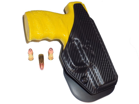 Aggressive Concealment outside the waistband paddle holster for Walther